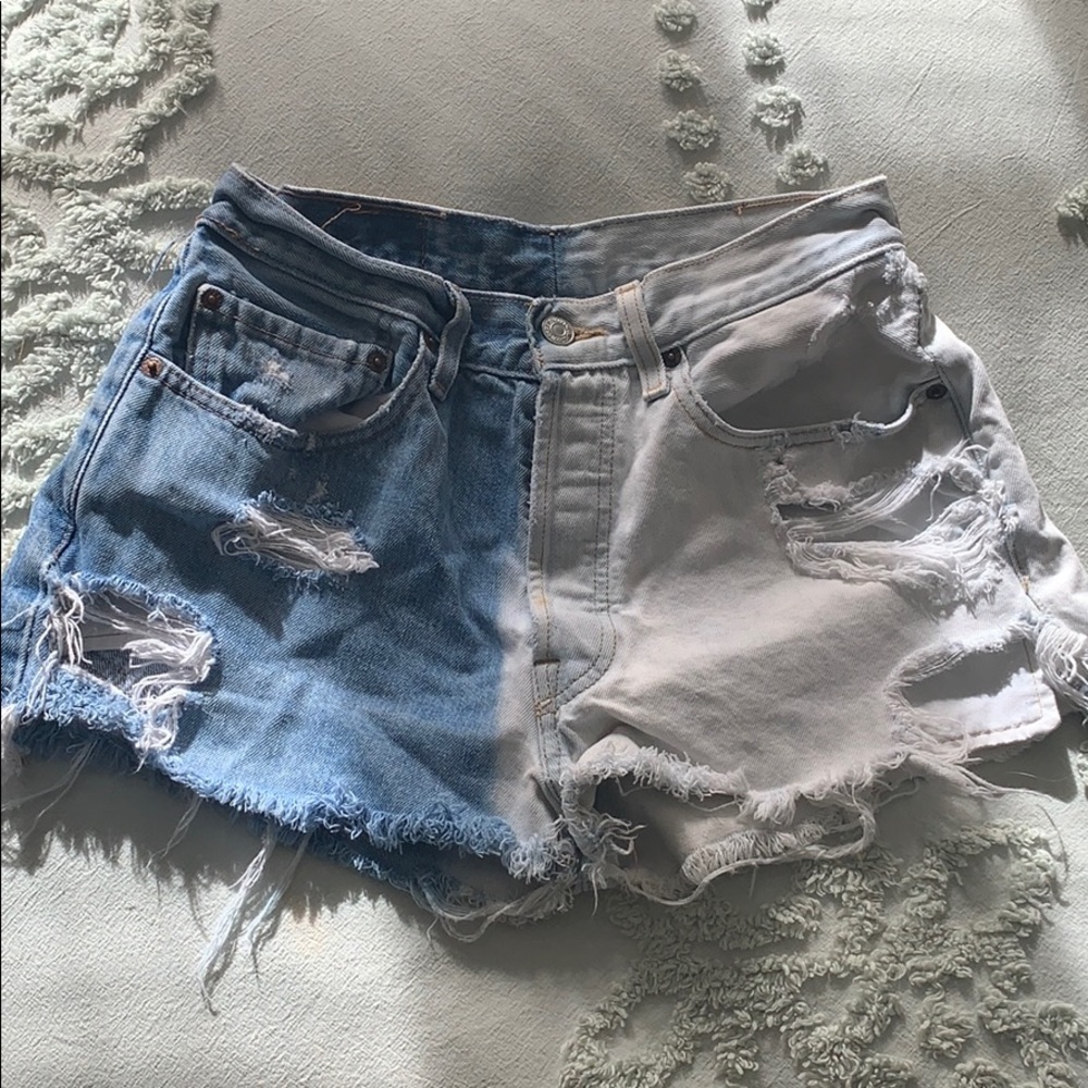 Vintage Levi’s two tone distressed denim shorts